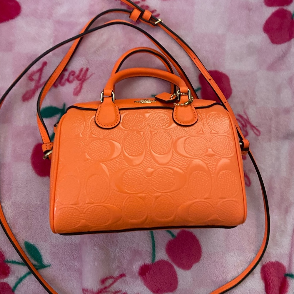 Orange mini Coach cross body